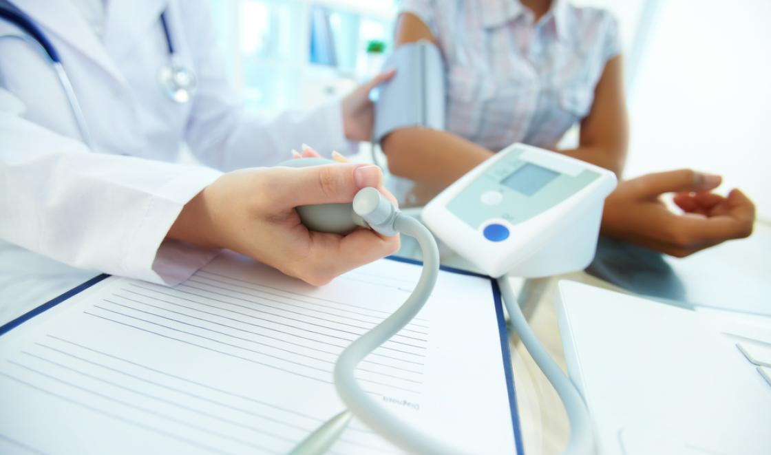 Dr checking blood pressure